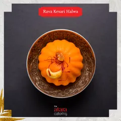 A beautifully molded Rava Kesari Halwa. This saffron-infused semolina dessert is a rich and aromatic sweet treat from our Indian dessert menu.