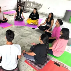 A meditation circle at the Rishikesh retreat. Sitting together in shared silence and mindfulness creates a powerful collective energy.