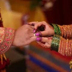The moment the ring is placed on the finger, a symbol of commitment we capture with focus and care.