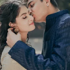 You glow differently when you're with your forever love. A tender moment from an engagement shoot, where the makeup is soft, romantic, and enhances her natural happiness.