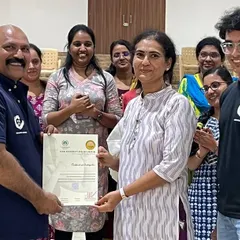 Presenting a certificate of participation to a doctor at the Sri Chamundeshwari Medical College. I believe acknowledging the effort and completion of the training is an important part of the experience.