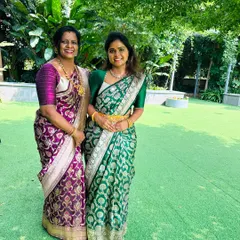 Me with my lovely mumma. I designed both of our blouses to complement our Banarasi sarees for a family function. She is my forever fashion partner.