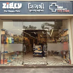 Another view of our welcoming storefront in Ahmedabad. The large glass windows offer a peek into the comprehensive pet care world we've created inside.