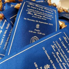 For a housewarming that feels like a royal decree, I created this beautiful scroll invitation. It's crafted from rich blue satin with elegant gold printing, making it a memorable way to welcome guests to your new home.