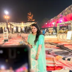 A candid moment captured at a grand wedding venue. I am always present at events to guide my clients, making sure they feel confident and ready before they step onto the dance floor.