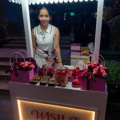 Here is our little stop and shop dream, all lit up and ready to welcome guests. I designed our gifting kiosk to be a beautiful and inviting centerpiece for any celebration. The glowing "WISH IT" sign is a beacon of warmth, promising a thoughtfully curated gift waiting inside.