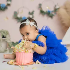 Getting right into the good stuff. I focus on capturing these deliciously messy details during a first birthday cake smash session.
