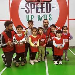 A happy group of kids with our coaches. We believe in building a positive and friendly relationship with every child, making our academy feel like a second home.
