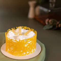 A tropical treat for one. Our Pineapple Bento Cake is light and fruity, with a beautiful abstract chocolate cage for an elegant finish.