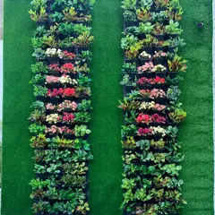 Here is a closer look at the detail in my artificial flower walls. I arrange different types and colors of flowers to create a natural, varied appearance that looks beautiful from any distance.