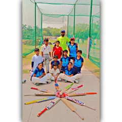 Our junior stars with their coach. We are not just a cricket academy; we are a family that learns and grows together.