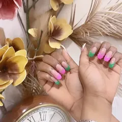 This angle showcases the sharp, clean lines of our modern French manicure, even with bright and unconventional colors.