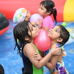 A sweet moment of friendship amidst the splashing fun. Our pool parties are all about creating happy, carefree memories for your little ones and their besties.
