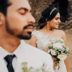 A creative portrait using focus to draw attention to the bride, Karen, while Abhijeet is softly blurred in the foreground. This adds artistic depth to their pre-wedding gallery.