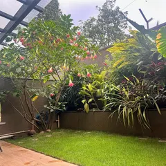 This is what garden goals look like. This beautiful backyard is the result of years of love and dedication from a wonderful family we work with. Seeing a garden mature and flourish like this, with a lush lawn and thriving plants, is the biggest reward for us.