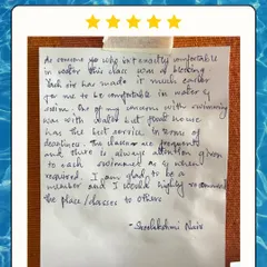 A handwritten testimonial from a member who was not comfortable in the water. She praises our coach and the cleanliness of our facility.