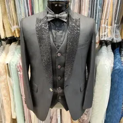 For a bold, unforgettable party look. This custom three piece suit features a striking black sequin lapel and a matching bow tie, designed to catch the light and ensure you are the center of attention.