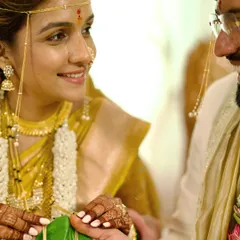 A close-up of a significant ritual during a Marathi wedding. The bride's gentle smile and the focus on the traditional elements showcase our attention to detail in capturing cultural ceremonies authentically.