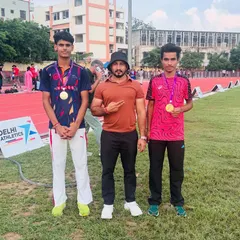 Gold is the only standard. Posing with two of my champion hurdlers after their win at the Open Delhi Athletics Championship. Their success is a testament to the relentless grind we put in day after day.