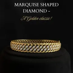 Golden classics never go out of style. This marquise-shaped diamond gold bangle is a nod to tradition and a symbol of enduring grace, adding a touch of heritage to every look.