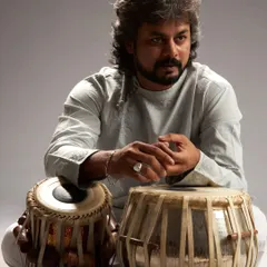Another shot from the same studio session. The focused expression here reflects the dedication and years of practice that go into mastering the art of the tabla.