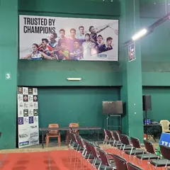 Our facility is designed to host events and provide a great viewing experience. The "Trusted by Champions" banner is a reminder of the standard we uphold.