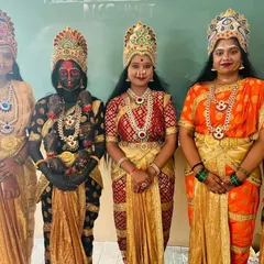 A full lineup of performers I prepared for a cultural event. This showcases my ability to create a variety of goddess looks, including Lakshmi and Kali, that work together as a cohesive group.