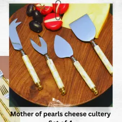 This mother-of-pearl cheese cutlery set of four is a beautiful and functional addition to any cheese board, perfect for entertaining guests.