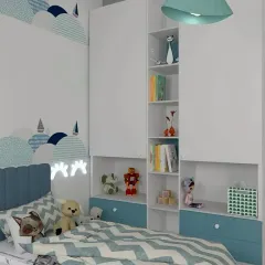 A sweet and serene nursery with a calming blue and white color palette. The whimsical wall decal and integrated shelving provide a perfect backdrop for a peaceful and organized space for a little one.