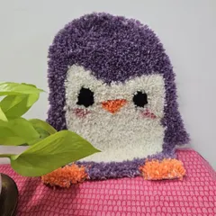 How cute is this fluffy purple penguin? This was created during one of my family tufting sessions. It's a great activity to do together and you get to take home an adorable creation.