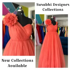 The same one-shoulder floral gown, now available in a beautiful coral orange color. The lightweight tulle fabric makes it comfortable and easy to wear.