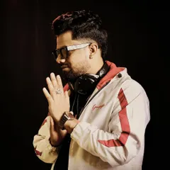 A stylish shot in a white and red jacket. My look is always curated to match the energy of the party.