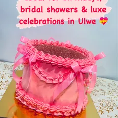This is my Pinterest-inspired Pink Bow Cake, perfect for luxe celebrations. It features delicate, hand-piped buttercream ruffles and is adorned with real satin ribbons for an extra touch of elegance.