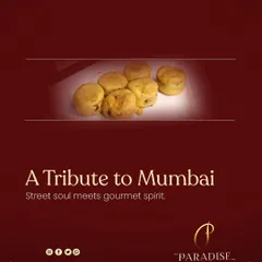 A tribute to Mumbai. We give the city's beloved Vada Pav a gourmet twist, presenting it as a bite-sized appetizer that captures the soul of Mumbai street food.