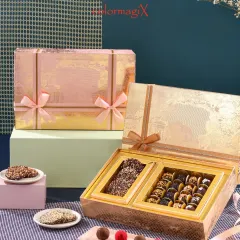 A taste of luxury. Our golden boxes are filled with an assortment of premium chocolates and chocolate-covered nut bars, making for a truly decadent gift.