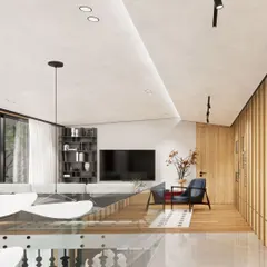 A view from the upper level of the duplex penthouse, looking down into the living area. The design uses clean lines, a glass railing, and strategic lighting to create a sense of openness and vertical space.
