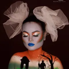 A softer, more reflective pose of the Independence Day makeup. This angle highlights the tricolor-inspired eyeshadow and the delicate details in the body art.