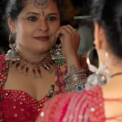 A close-up of the Navratri look, showing the detailed silver maang tikka and jhumkas that complete the traditional Garba style.