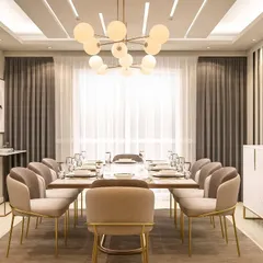 A modern dining room setup with contemporary globe chandeliers, beige upholstered chairs with gold-finished legs, and elegant white sideboards.