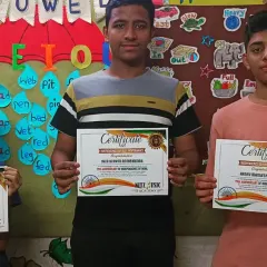 Our students proudly holding their certificates after a performance. We believe in recognizing their hard work and progress, and certificates are a great way to boost their morale.