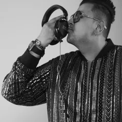 A black and white shot, kissing my headphones. This is my love, my passion, my life. Music is everything.
