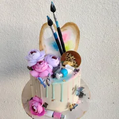 Another view of my art-themed cake, perfect for the creative soul. It features an artist's palette, paintbrushes, and a colorful drip effect, all completely edible.