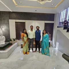 A photo with our clients, Mr. and Mrs. Shreyas, inside their beautiful new villa. It was a pleasure to bring their vision for a contemporary and serene home to life.