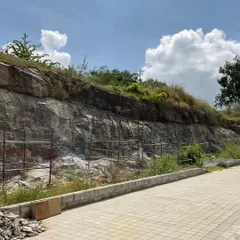 Our design process is deeply connected to the site's context. Here is the natural rock quarry located next to one of our projects, which served as direct inspiration for an interior feature.