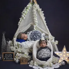A brother and sister twin duo in a beautiful, dreamy setup. I used a lace teepee and soft white props to create this magical winter wonderland theme. It’s so special to capture the bond between boy girl twins.