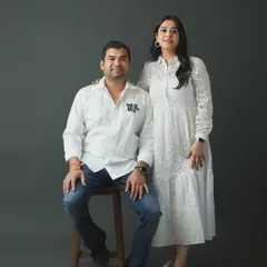 A simple and elegant studio portrait of a couple. Before the kids join in, we love to take a few moments to capture the parents together, celebrating their connection.