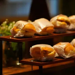 Bite-sized and delicious. These mini buns are a great addition to any party menu, easy for guests to grab and enjoy while they mingle.
