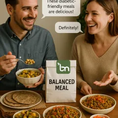 Here is a happy couple enjoying a spread of our delicious diabetic-friendly meals. It shows that eating healthy can be a shared, enjoyable experience, with plenty of variety like different sabzis, rotis, and salads to choose from.