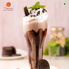 Dive into our Oreo Chocolate Shake, a fan favorite for a reason. We blend rich chocolate and real Oreo cookies into a thick, satisfying shake, then top it with whipped cream and more cookie crumbles. It's pure, chilled indulgence in a glass.