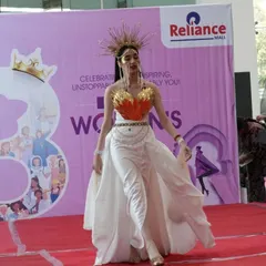 A model walks the ramp in a stunning creation by one of our students during a fashion show held at Reliance Mall for International Women's Day.